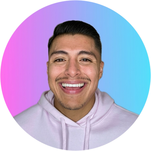 Jonathan 'Joni' Vasquez (@jonillovace) smiling in a pastel pink hoodie